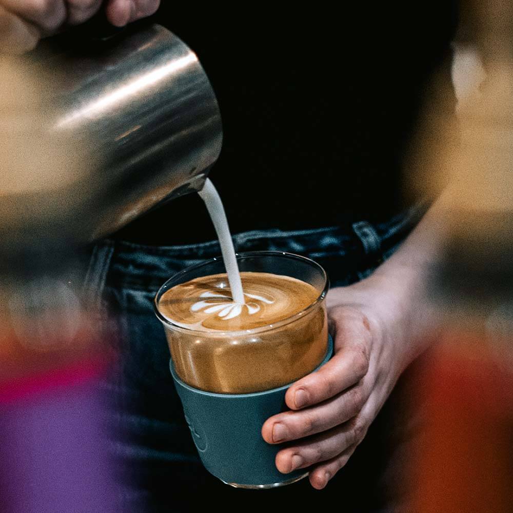 Coffee being poured at Tinderbox Queen Street Station, Glasgow